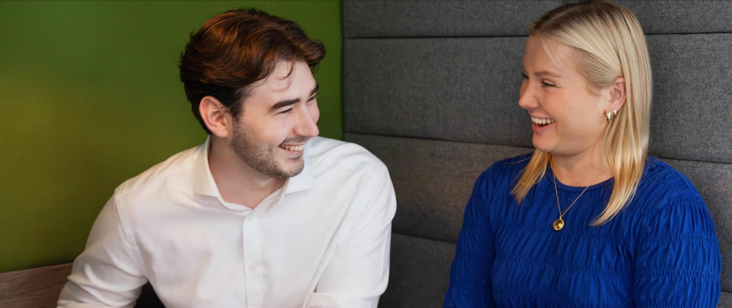 man and woman smiling