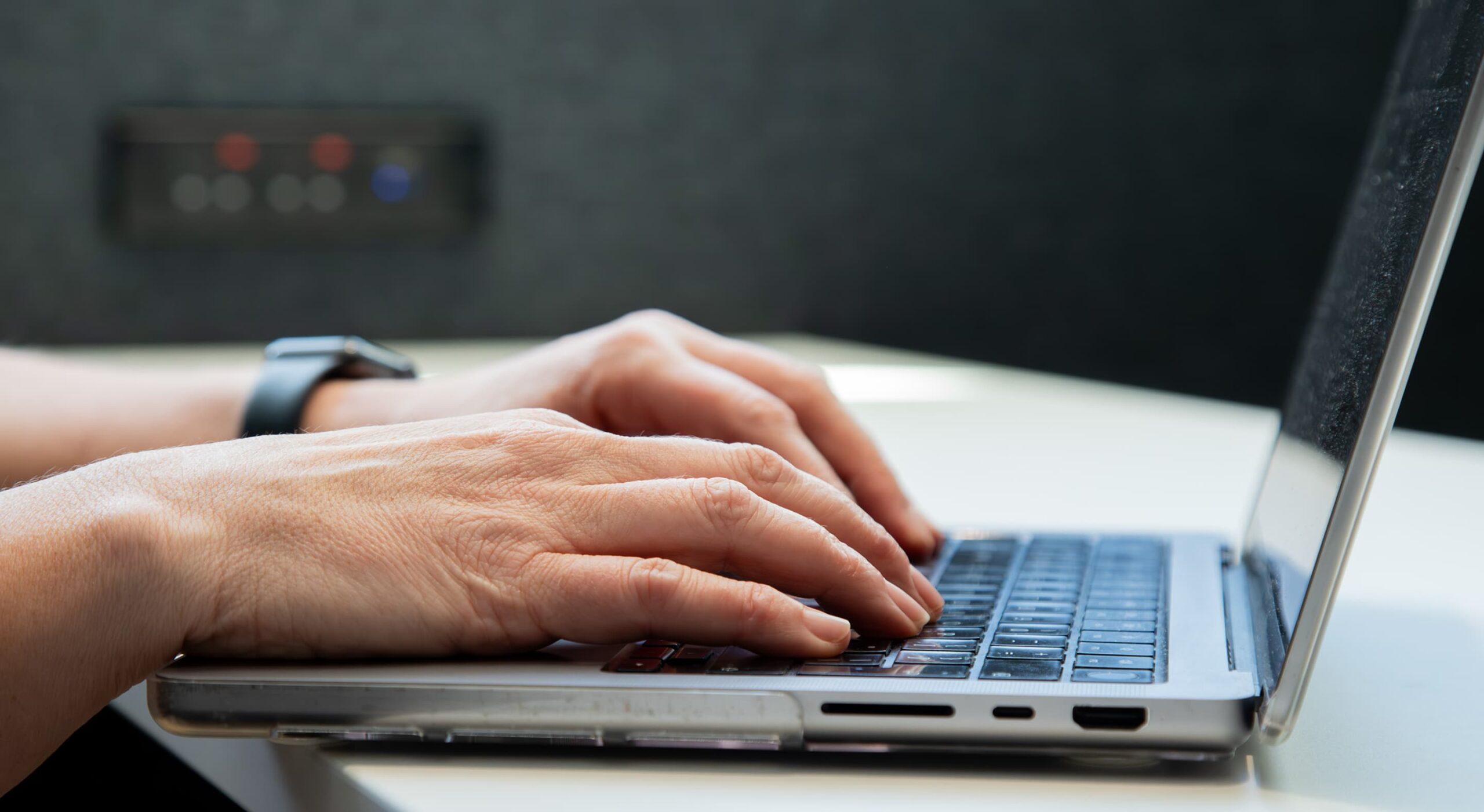 Adviser working on a laptop