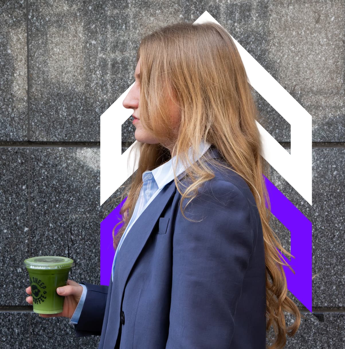 woman walking with a drink